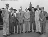 Al&#39;s last run. L-R: Bill Strandrud, Fireman; Frank Crutchley, Road Foreman; Dick Tanguay, Trainmaster; Bill Lowney, Master Mechanic; Reggie Whitman, Supt; George Leu - Local Chmn BofLE; Al Strandrud, Engineer; Lee Barnes, Trainmaster.