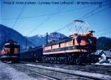 GN 5017 Y-1 class electric locomotive on GN Train #6, The Cascadian at Skykomish, WA.&nbsp; Note &quot;high car&quot; at left used for maintaining catenary. Philip B. Korst, Jr. photo courtesy GNRHS member Lyndsay Korst. See many more photos at <a href="http://www.gngoat.org">http://www.gngoat.org</a>